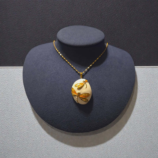 Gold Plated Orange Enameled Dragonfly Pendant on a 18K Gold PVD Stainless Steel Singapore Chain Necklace